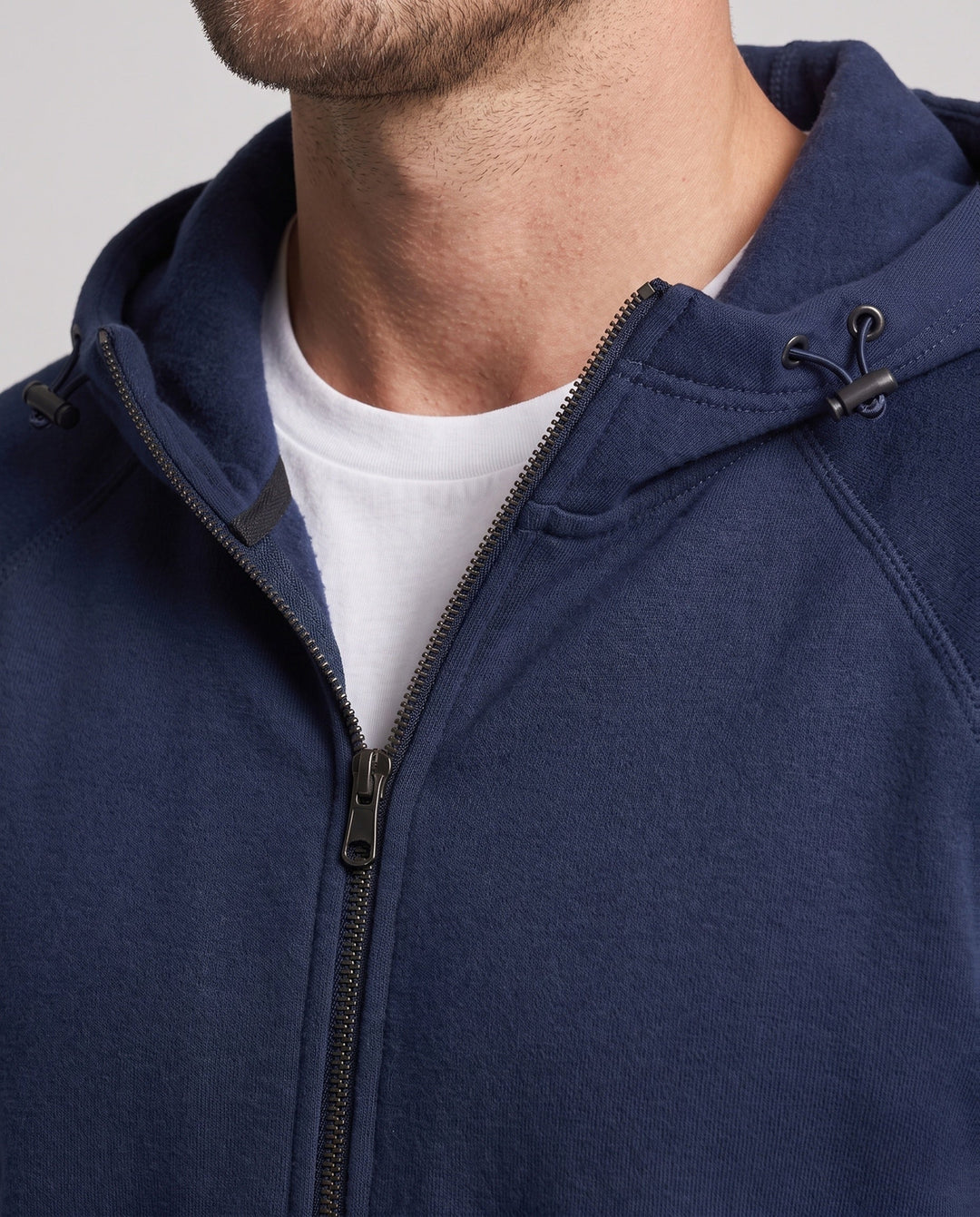 Men's structured hooded fleece jacket with raglan sleeves and kangaroo pockets