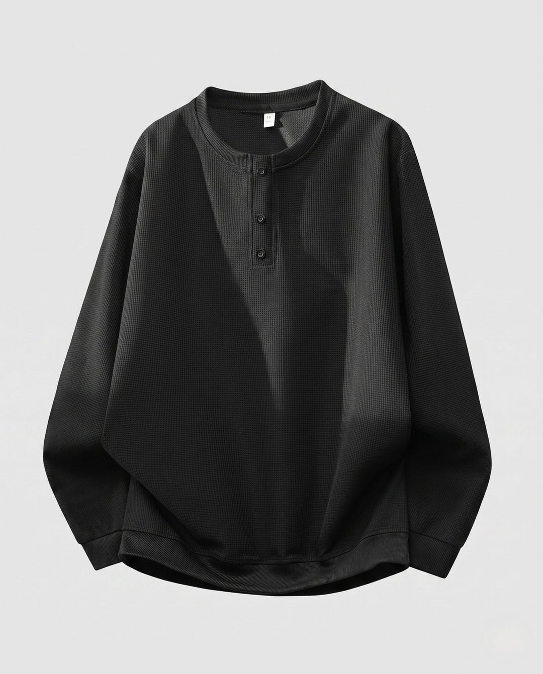 Men's thermal waffle long sleeve with Henley button placket, relaxed fit and ribbed cuffs