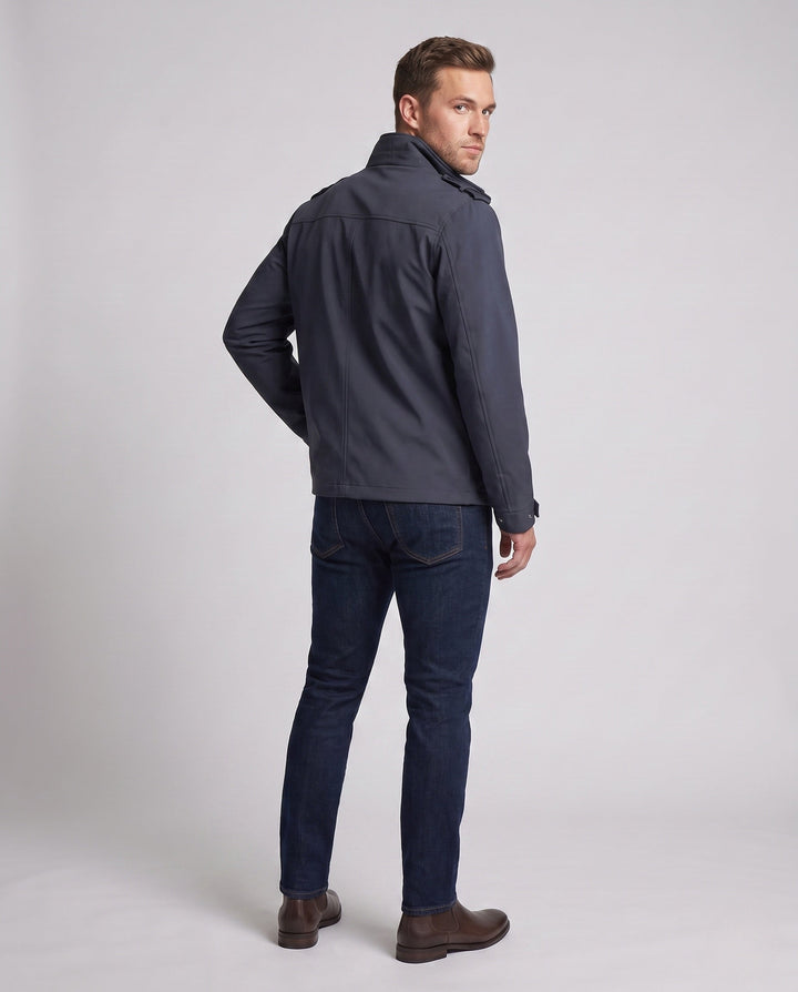 Men's urban functional jacket with concealed front flap, contrasting piping, and adjustable hem