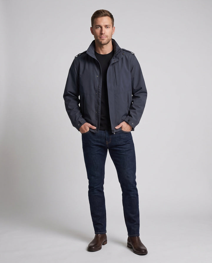 Men's urban functional jacket with concealed front flap, contrasting piping, and adjustable hem