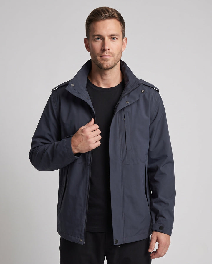 Men's urban functional jacket with concealed front flap, contrasting piping, and adjustable hem