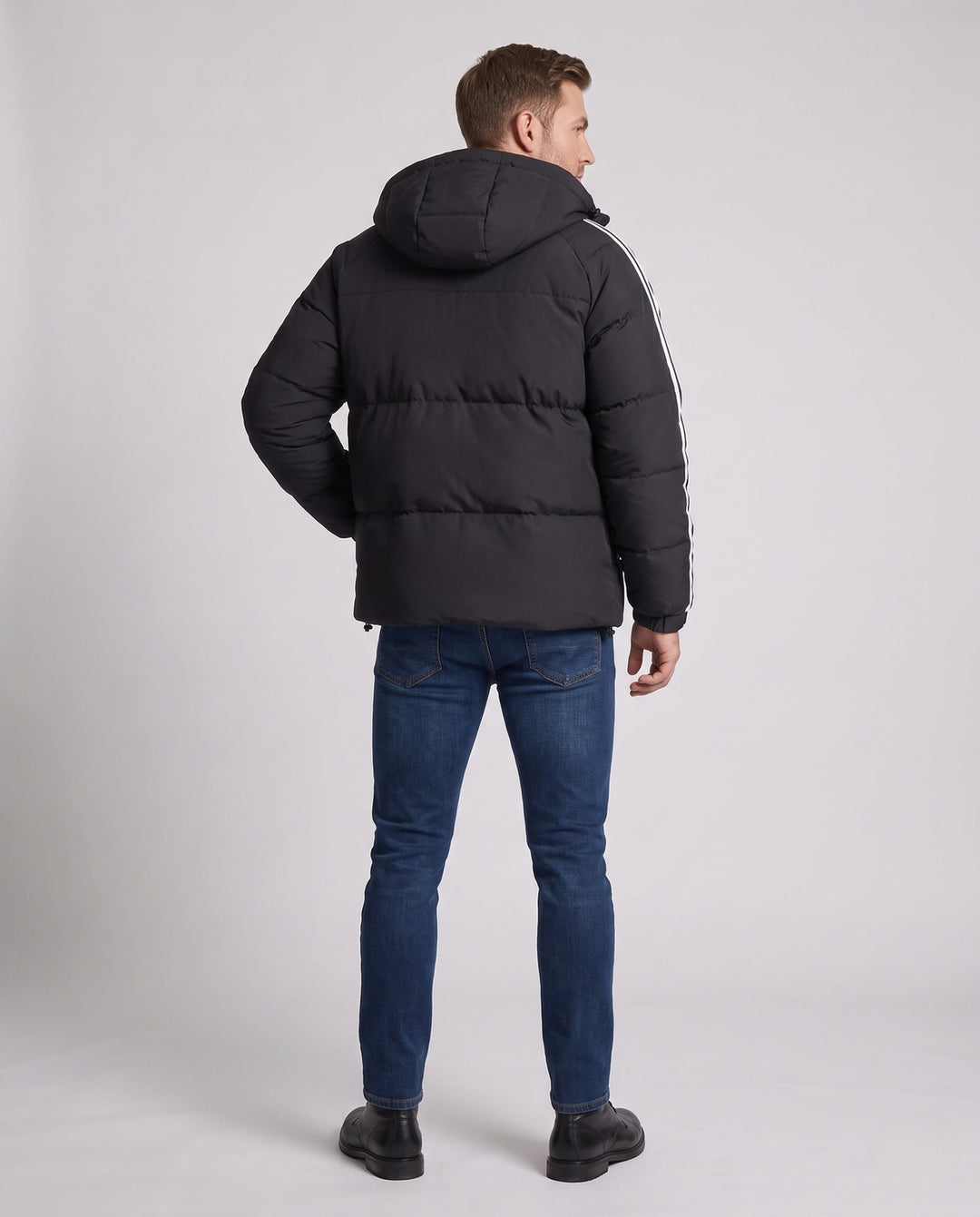 Men's padded hooded jacket in sporty streetwear look with contrasting stripe sleeves and wind-resistant outer shell