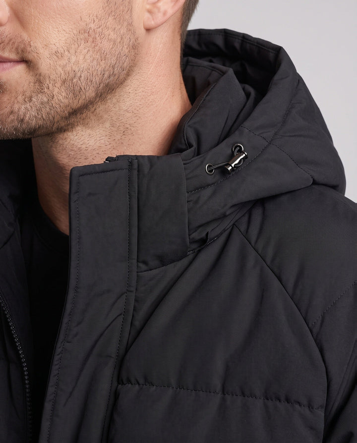 Men's padded hooded jacket in sporty streetwear look with contrasting stripe sleeves and wind-resistant outer shell