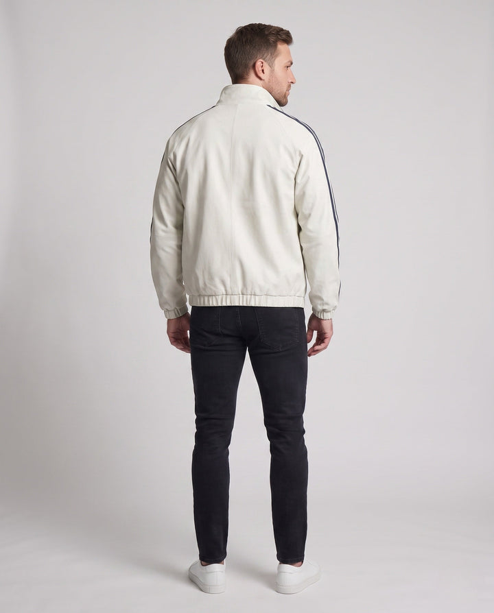 Unisex reversible sports jacket with reversible design, stand-up collar, full-length zipper, and distinctive sleeve stripes