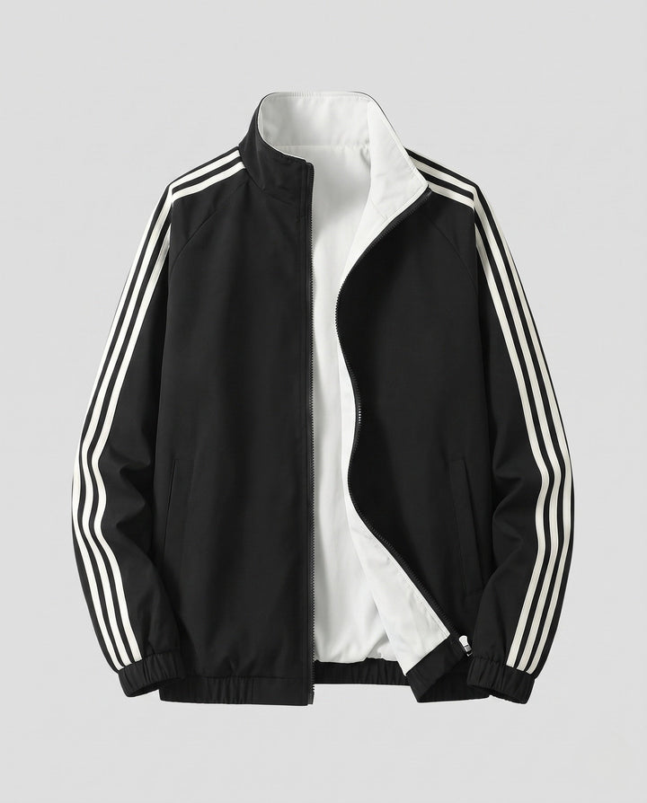 Unisex reversible sports jacket with reversible design, stand-up collar, full-length zipper, and distinctive sleeve stripes