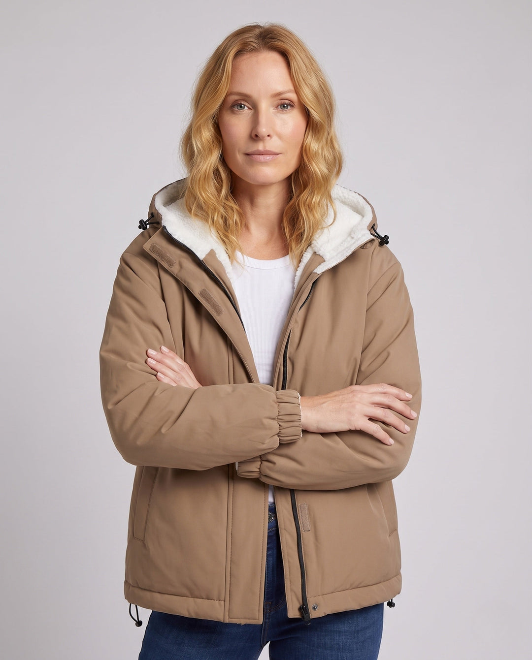 Unisex padded hoodie with teddy fleece lining, concealed front placket and adjustable hem