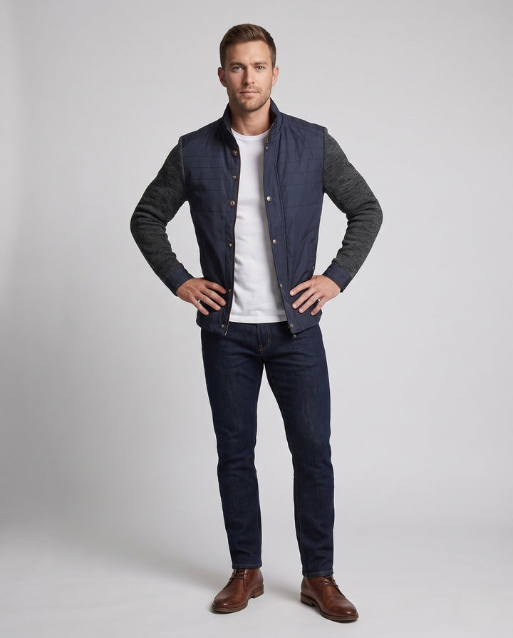 Men's hybrid jacket with faux leather front, quilted detail, and knit sleeves