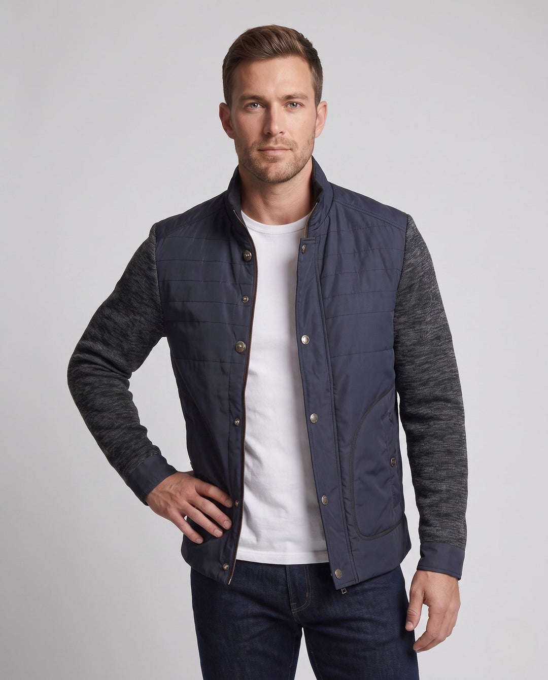 Men's hybrid jacket with faux leather front, quilted detail, and knit sleeves
