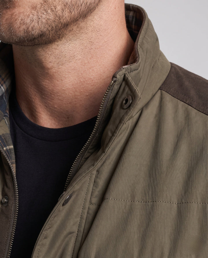 Men's compact quilted jacket in travel look with high collar and contrasting trim