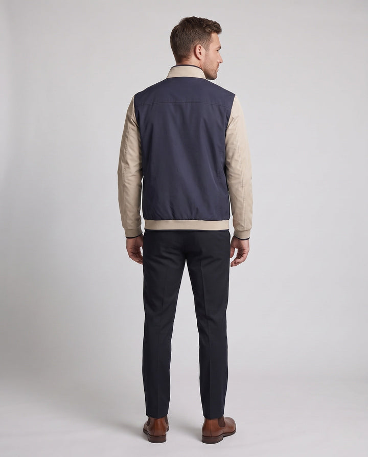 Men's lightly padded city jacket with contrast sleeves, stand-up collar, and decorative inner lining