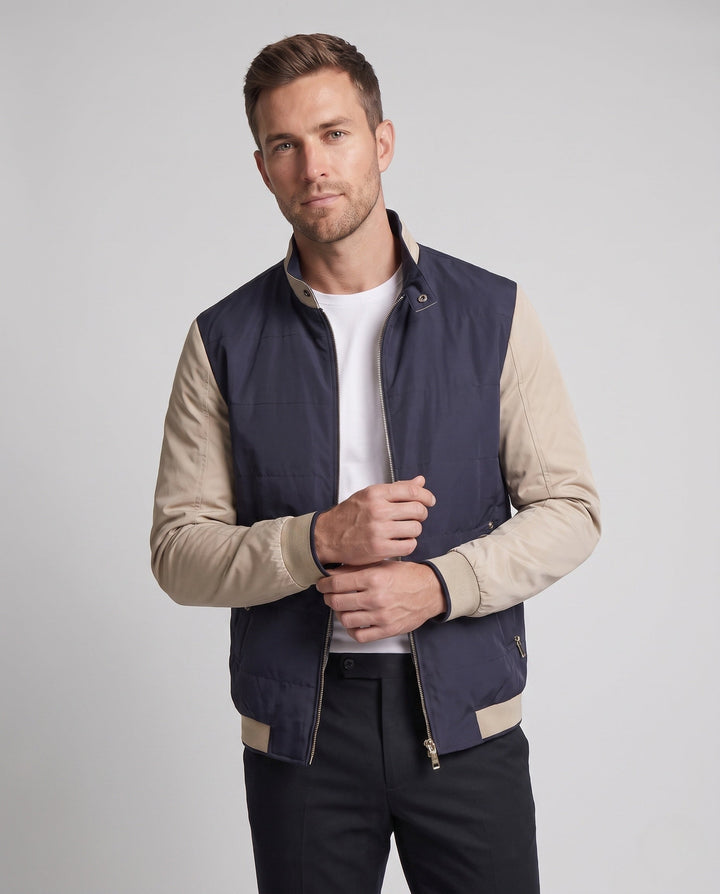 Men's lightly padded city jacket with contrast sleeves, stand-up collar, and decorative inner lining