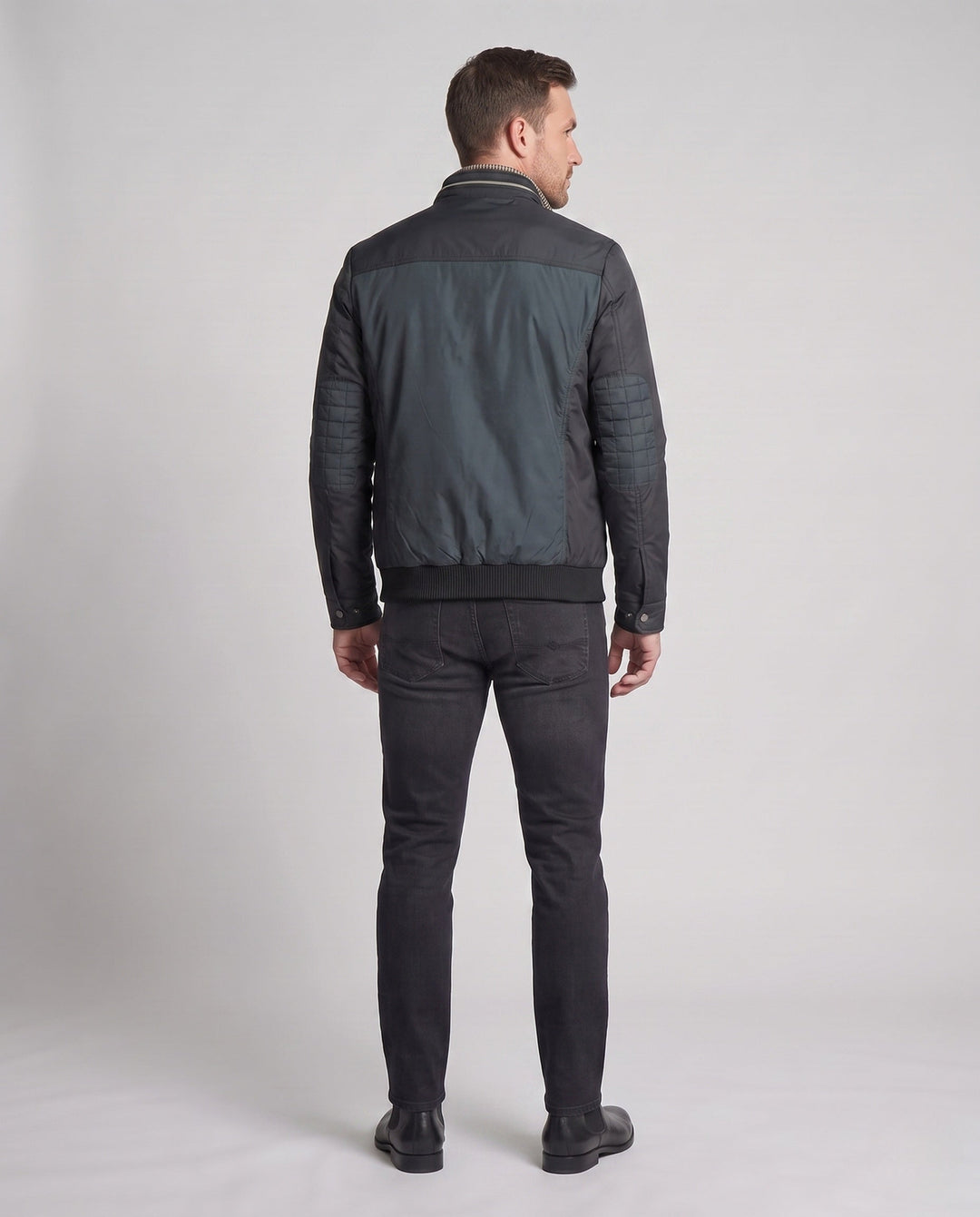 Men's modern quilted transitional jacket in a material mix with zippered chest pocket