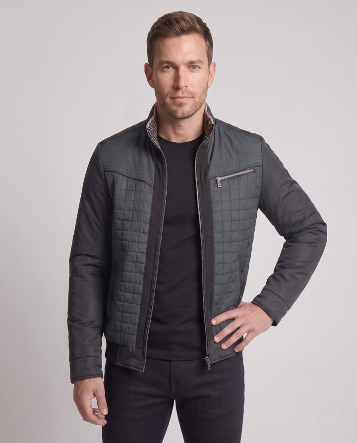 Men's modern quilted transitional jacket in a material mix with zippered chest pocket