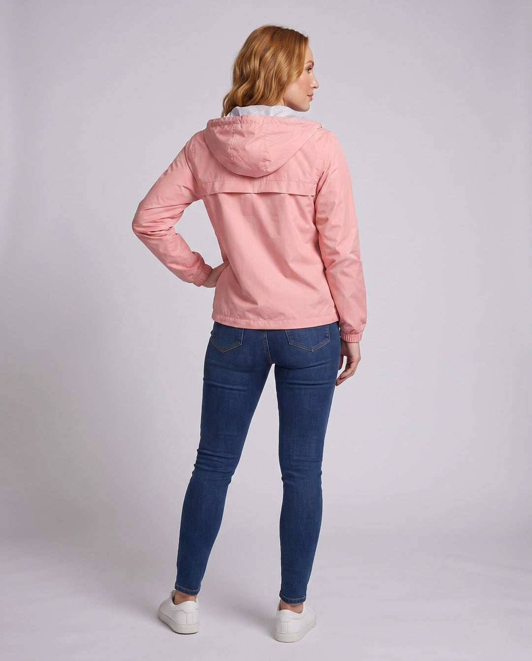 Women's lightweight hooded windbreaker with breathable lining and zipper