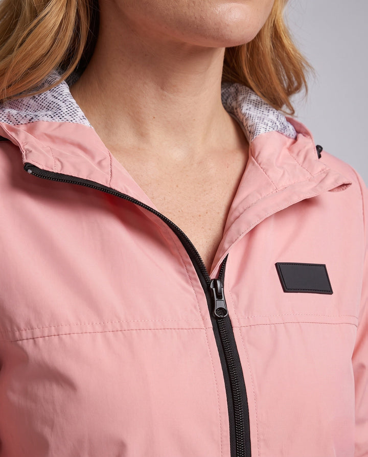 Women's lightweight hooded windbreaker with breathable lining and zipper