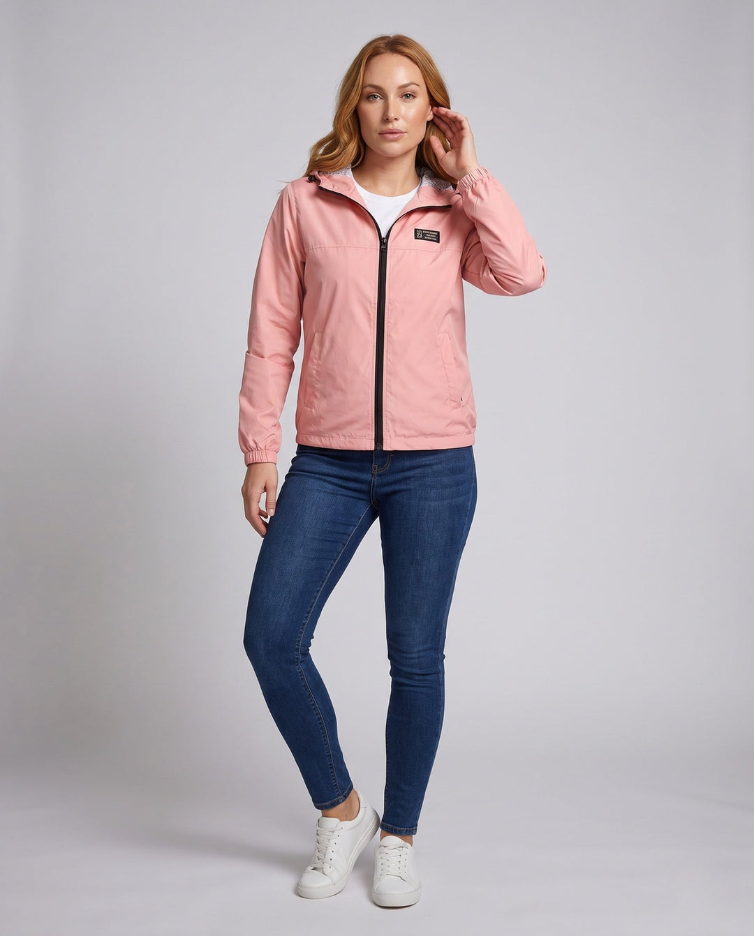 Women's lightweight hooded windbreaker with breathable lining and zipper