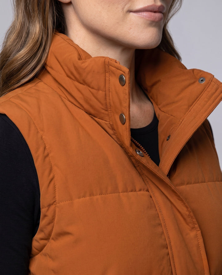 Women’s lightweight quilted hooded vest with thermal lining, wind protection, and side pockets