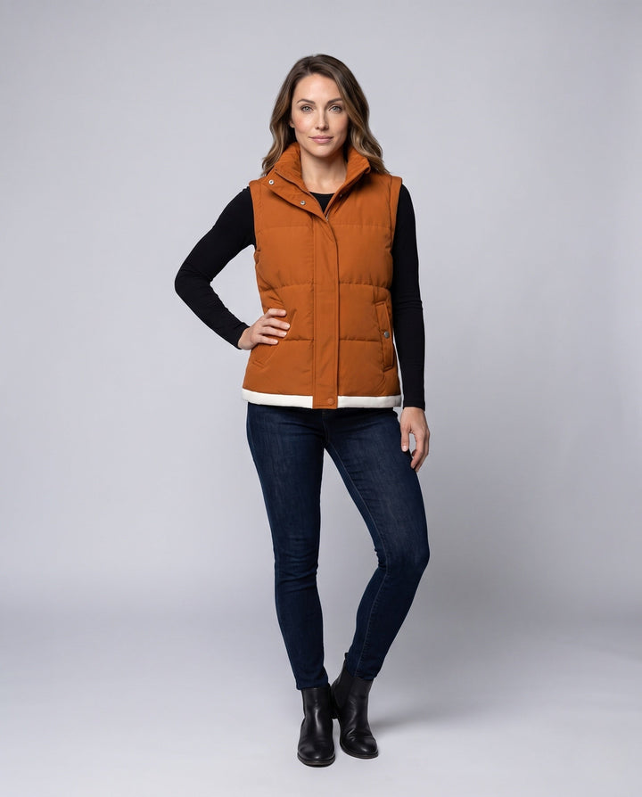 Women’s lightweight quilted hooded vest with thermal lining, wind protection, and side pockets