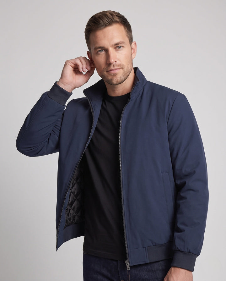 Men's lightweight quilted windbreaker jacket with stand-up collar and zippered pockets