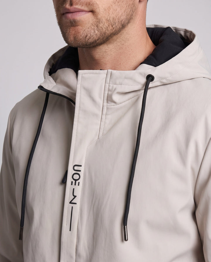 Men's modern lightweight softshell hybrid hoodie jacket with adjustable hood and waterproof zip pockets