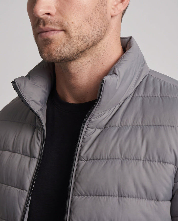 Men's ultralight quilted jacket in minimal design with heat-insulating synthetic filling
